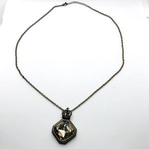 Unknown brand necklace with octagon shaped Jew with a crown top.